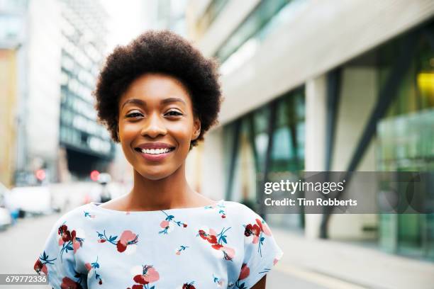 portrait of smiling woman - patterned blouse stock pictures, royalty-free photos & images