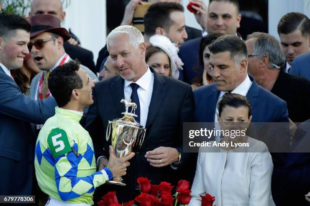 Trainer Todd Pletcher celebrates with jockey John Velazquez after Always Dreaming won the 143rd running of the Kentucky Derby at Churchill Downs on...