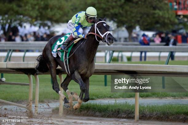 Always Dreaming, ridden by jockey John Velazquez, leads the field coming out of the fourth turn during the 143rd running of the Kentucky Derby at...