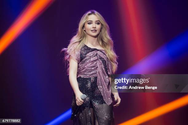 Sabrina Carpenter joins The Vamps on stage at Manchester Arena on May 6, 2017 in Manchester, England.