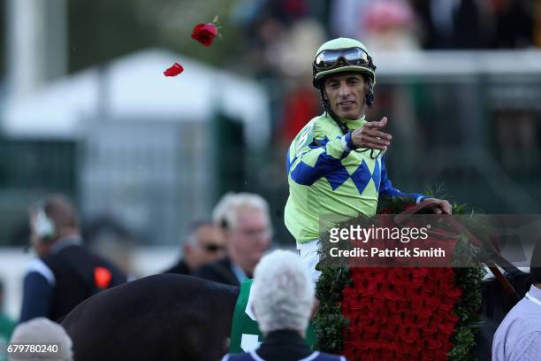 Jockey John Velazquez celebrates atop Always Dreaming after winning the 143rd running of the Kentucky Derby at Churchill Downs on May 6, 2017 in...