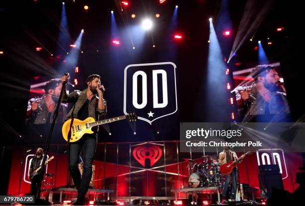 Musicians Geoff Sprung, Matthew Ramsey, and Brad Tursi of Old Dominion perform onstage during the 2017 iHeartCountry Festival, A Music Experience by...