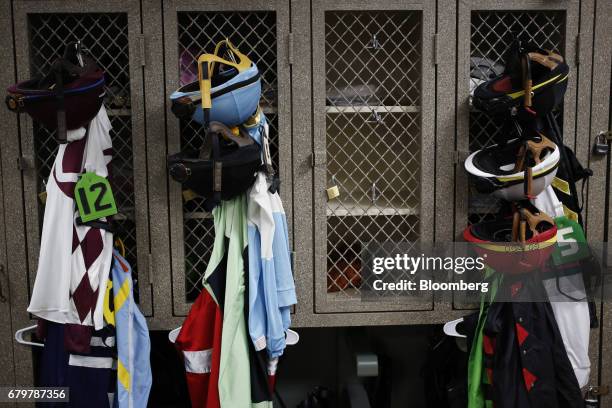 Racing silks and helmets are pictured in the jockey's locker room before the 143rd running of the Kentucky Derby at Churchill Downs in Louisville,...