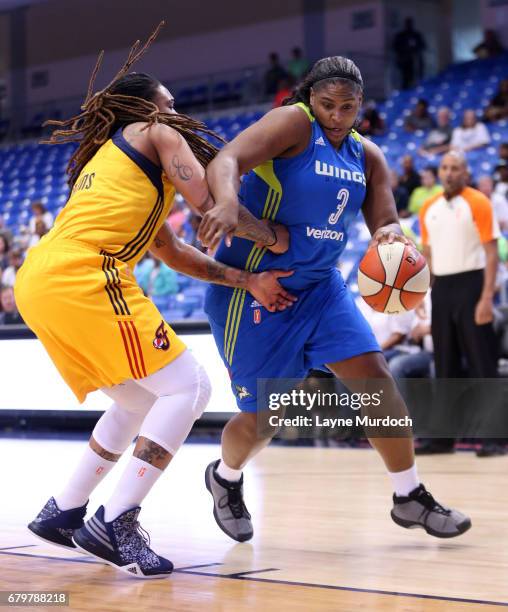 Courtney Paris of the Dallas Wings drives to the basket against Indiana Fever in a WNBA game on May 6, 2017 at College Park Center in Arlington,...