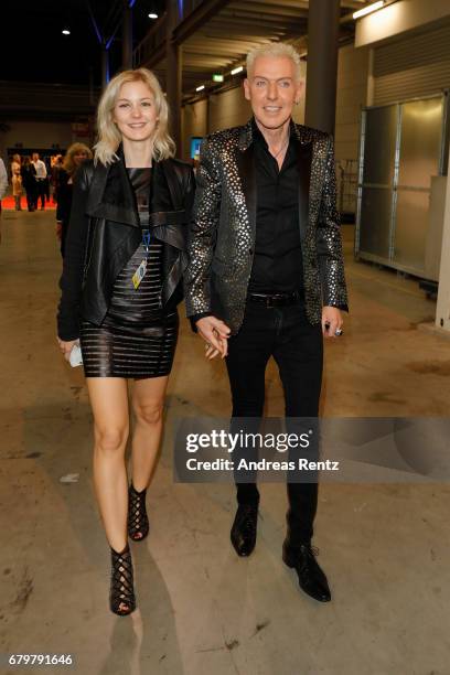 Hans-Peter Geerdes aka HP Baxxter and his girlfriend Lysann Geller attend the after show during the finals of the tv competition 'Deutschland sucht...