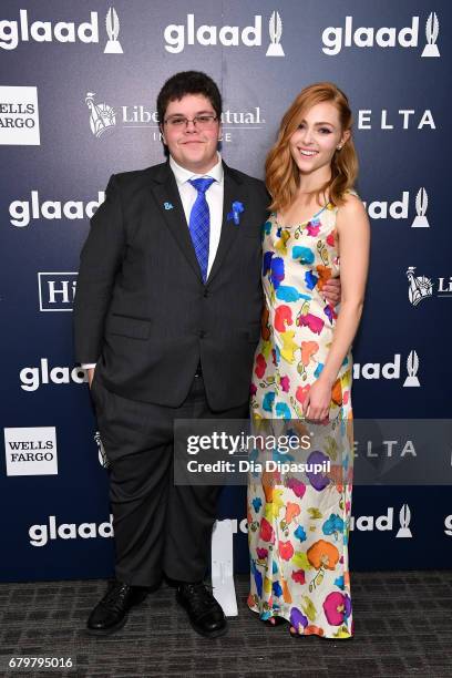 Presenter Gavin Grimm and AnnaSophia Robb pose backstage at the 28th Annual GLAAD Media Awards at The Hilton Midtown on May 6, 2017 in New York City.