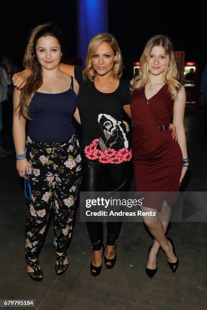 Michelle with her daughters Celine Oberloher and Marie-Louise Reim attend the after show party during the finals of the tv competition 'Deutschland...