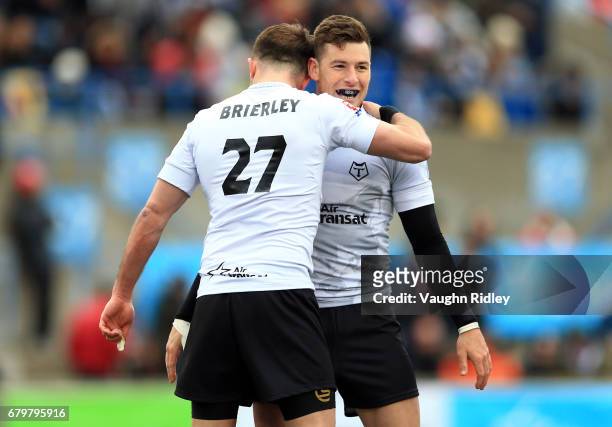Ryan Brierley of Toronto Wolfpack is congratulated after scoring a try by Blake Wallace during the second half of a Kingstone Press League 1 match...