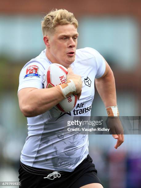 Dan Fleming of Toronto Wolfpack runs with the ball during the second half of a Kingstone Press League 1 match against Oxford RLFC at Lamport Stadium...