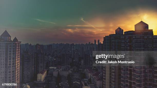 shanghaian sunset - jakob montrasio stock pictures, royalty-free photos & images