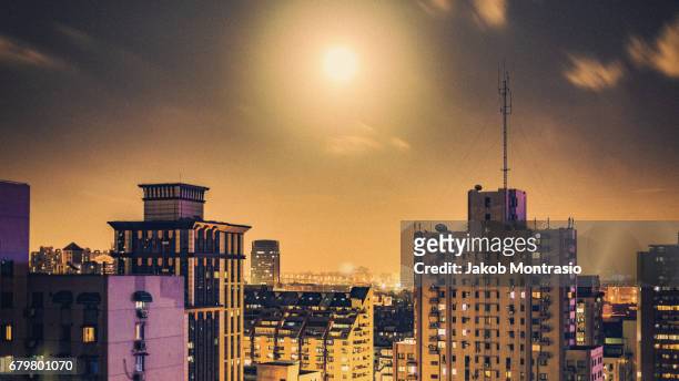 when the moon hits the sky - jakob montrasio stock pictures, royalty-free photos & images