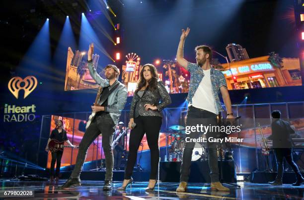 Singers Dave Haywood, Hillary Scott, and Charles Kelley of Lady Antebellum perform onstage during the 2017 iHeartCountry Festival, A Music Experience...