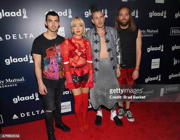Members of DNCE Joe Jonas, JinJoo Lee, Cole Whittle and Jack Lawless attend as Ketel One Vodka sponsors the 28th Annual GLAAD Media Awards in New...