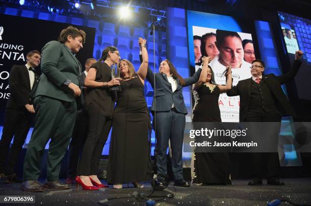 Deborah Esquenazi; Elizabeth Ramirez, Anna Vasquez, Cassandra Rivera and Kristie Mayhugh accept an award onstage during the 28th Annual GLAAD Media...