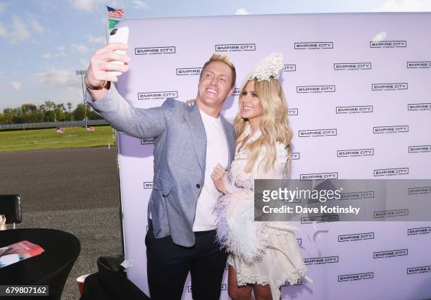 Player Kroy Biermann and TV Personality Kim Zolciak attend as Kim Zolciak hosts the Kentucky Derby hat contest at Empire City Casino at Yonkers...