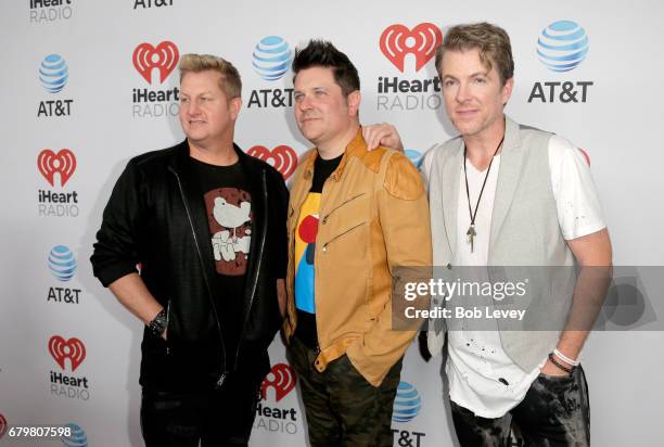 Singer Gary LeVox and musicians Jay DeMarcus and Joe Don Rooney of Rascal Flatts attend the 2017 iHeartCountry Festival, A Music Experience by AT&T...