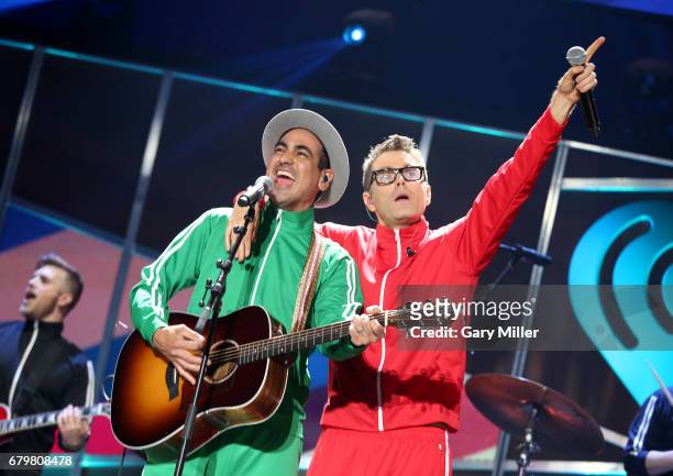 Musicians Producer Eddie and Bobby Bones of Bobby Bones and the Raging Idiots perform onstage during the 2017 iHeartCountry Festival, A Music...