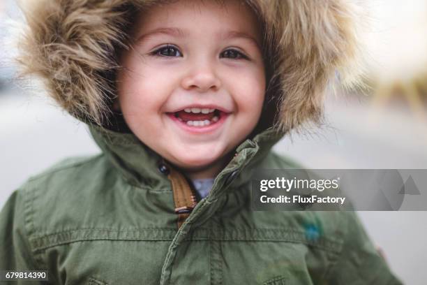 smile of purity - baby tooth stock pictures, royalty-free photos & images