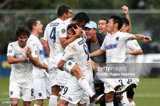Emiliano Tade and Darren White of Auckland City celebrate the win during the OFC Champions League Final match between Team Wellington and Auckland...