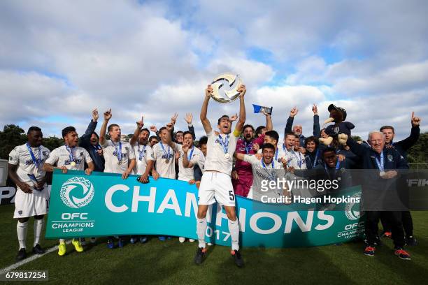 Captain Angel Berlanga of Auckland City celebrates with teammates after winning the OFC Champions League Final match between Team Wellington and...