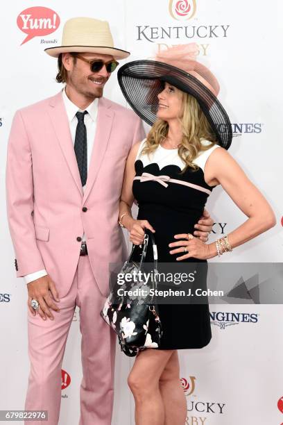 Christopher Backus and Mira Sorvino attend the 143rd Kentucky Derby at Churchill Downs on May 6, 2017 in Louisville, Kentucky.