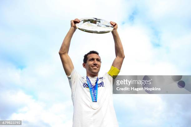 Captain Angel Berlanga of Auckland City holds the OFC Champions League trophy after winning the OFC Champions League Final match between Team...