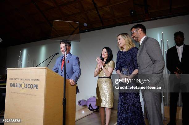 Honoree Kaii Davis Jarrahy; CEO of UCLA Hospital System Johnese Spisso, Geena Davis and Reza Jarrahy seen onstage during UCLA Mattel Children's...