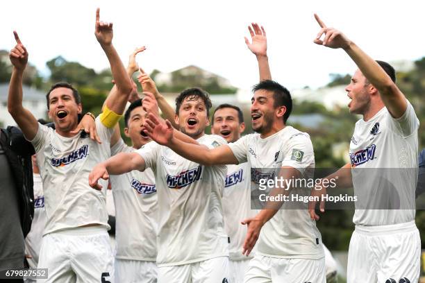 To R, Angel Berlanga, Darren White, Emiliano Tade and Marko Dordevic of Auckland City celebrate after winning the OFC Champions League Final match...