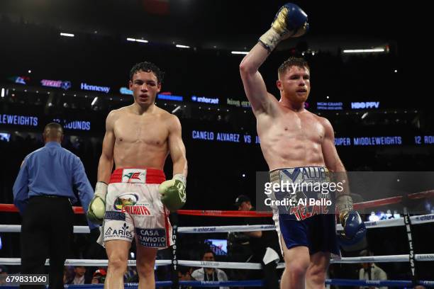 Canelo Alvarez celebrates after going twelve rounds against Julio Cesar Chavez Jr. During their catchweight bout at T-Mobile Arena on May 6, 2017 in...