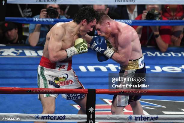 Canelo Alvarez punches Julio Cesar Chavez Jr. During their catchweight bout at T-Mobile Arena on May 6, 2017 in Las Vegas, Nevada. Alvarez won by...