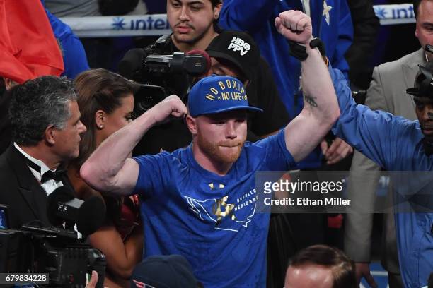 Canelo Alvarez celebrates his unanimous-decision victory over Julio Cesar Chavez Jr. In their catchweight bout at T-Mobile Arena on May 6, 2017 in...