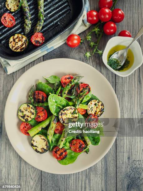 grilled asparagus,courgette and cherry tomatoes salad - cooked asparagus stock pictures, royalty-free photos & images