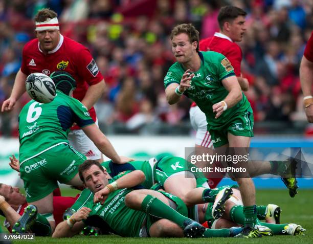 Kiernan Marmion of Connacht passes the ball during the Guinness PRO12 rugby match between Munster Rugby and Connacht Rugby at Thomond Park Stadium in...