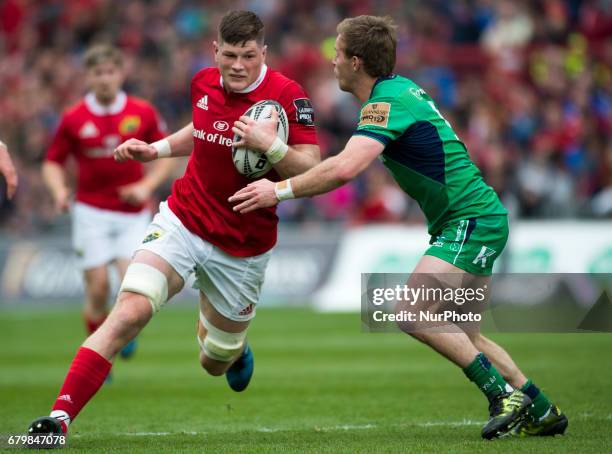 Jack O'Donoghue of Munster and Kiernan Marmion of Connacht during the Guinness PRO12 rugby match between Munster Rugby and Connacht Rugby at Thomond...