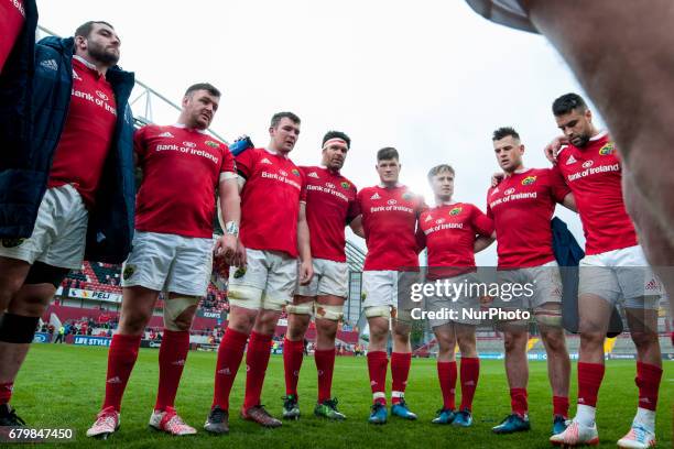 The Munster players in a huddle after the Guinness PRO12 rugby match between Munster Rugby and Connacht Rugby at Thomond Park Stadium in Limerick,...