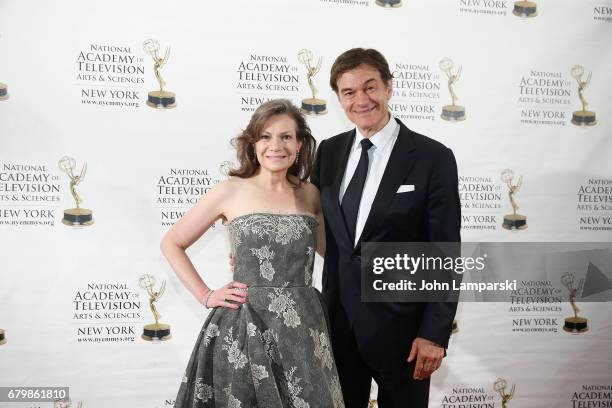 Denise Rover and Dr. Mehmet Oz attend 60th Anniversary New York Emmy Awards Gala at Marriott Marquis Times Square on May 6, 2017 in New York City.