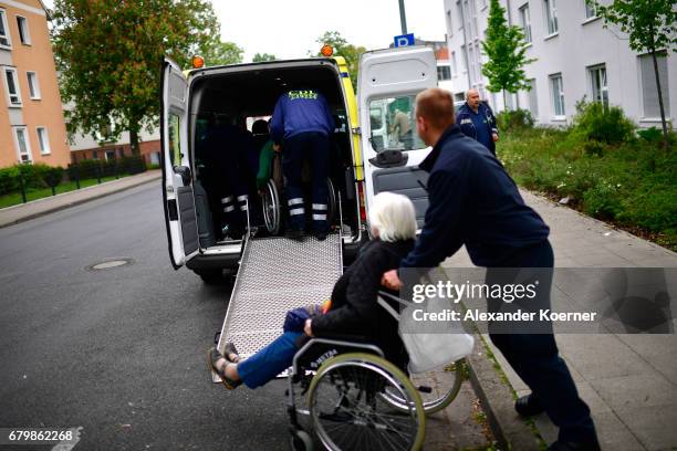 Elderly people from a senior care facility wait to board a bus as part of the evacuation of 50,000 people on May 7, 2017 in Hanover, Germany. Bomb...