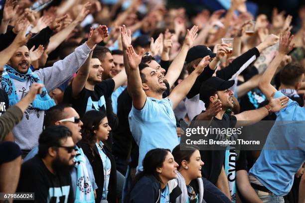 Sydney FC fans show their colour during the 2017 A-League Grand Final match between Sydney FC and the Melbourne Victory at Allianz Stadium on May 7,...