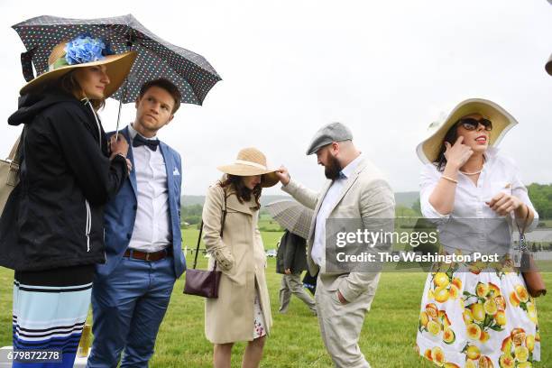 May 06: Jaclyn Mohlmann, left to right, Nick Havrilak, Carly Crane, Dustin Burton, and Caren Welker gather to watch the Virginia Gold Cup Races at...