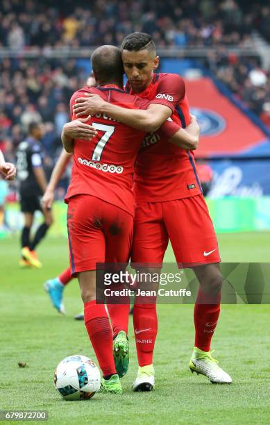 Lucas Moura of PSG celebrates his goal with Marquinhos during the French Ligue 1 match between Paris Saint-Germain and SC Bastia at Parc des Princes...