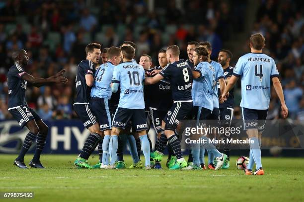 Sydney FC and Victory players scuffle during the 2017 A-League Grand Final match between Sydney FC and the Melbourne Victory at Allianz Stadium on...