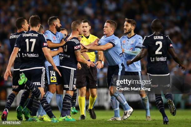 James Troisi of Melbourne Victory scuffles with Brandon O'Neill of Sydney FC during the 2017 A-League Grand Final match between Sydney FC and the...