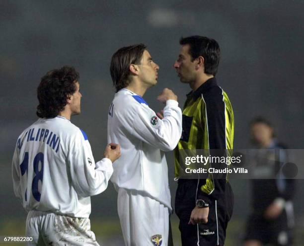 Antonio FILIPPINI and Fabio PETRUZZI of BRESCIA discussing with referee PAPARESTA during the SERIE A 21st Round League match between Brescia and...