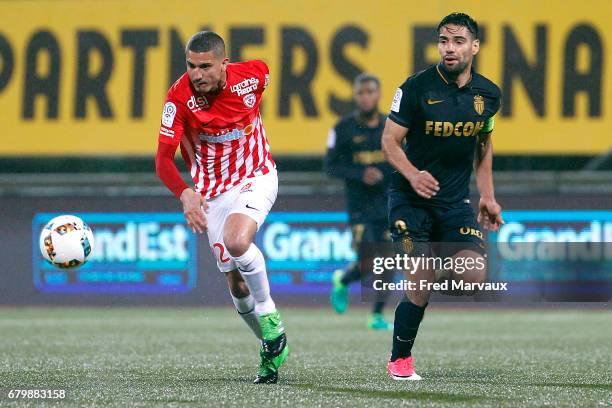 Michael Chretien of Nancy and Radamel Falcao of Monaco during the Ligue 1 match between As Nancy Lorraine and As Monaco at Stade Marcel Picot on May...