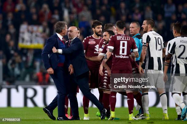 Sinisa Mihajlovic , head coach of Torino FC, protests to the referee Paolo Valeri after the expulsion of Afriyie Acquah during the Serie A football...