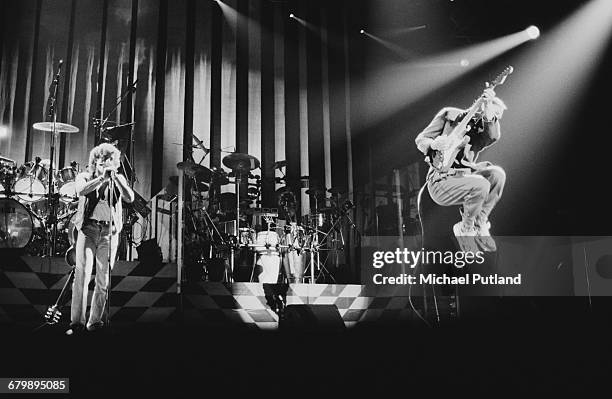 Roger Daltrey and Pete Townshend performing with The Who on stage in Birmingham, 1989.