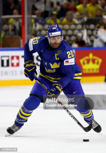 Joel Jundqvist of Sweden skates with the puck during the 2017 IIHF Ice Hockey World Championship game between Germany and Sweden at Lanxess Arena on...