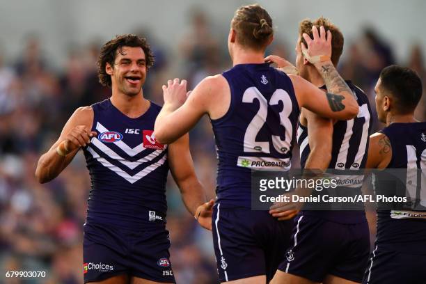 Brady Grey and Cam McCarthy of the Dockers celebrates a goal during the 2017 AFL round 07 match between the Fremantle Dockers and the Essendon...
