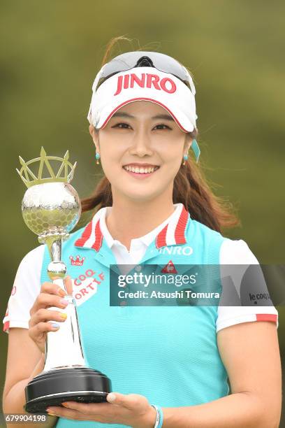 Ha-Neul Kim of South Korea poses with the trophy after winning the World Ladies Championship Salonpas Cup at the Ibaraki Golf Club on May 7, 2017 in...