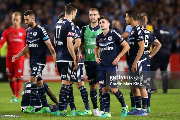 Marco Rojas of Melbourne Victory and team mates look dejected after losing the penalty shoot out during the 2017 A-League Grand Final match between...
